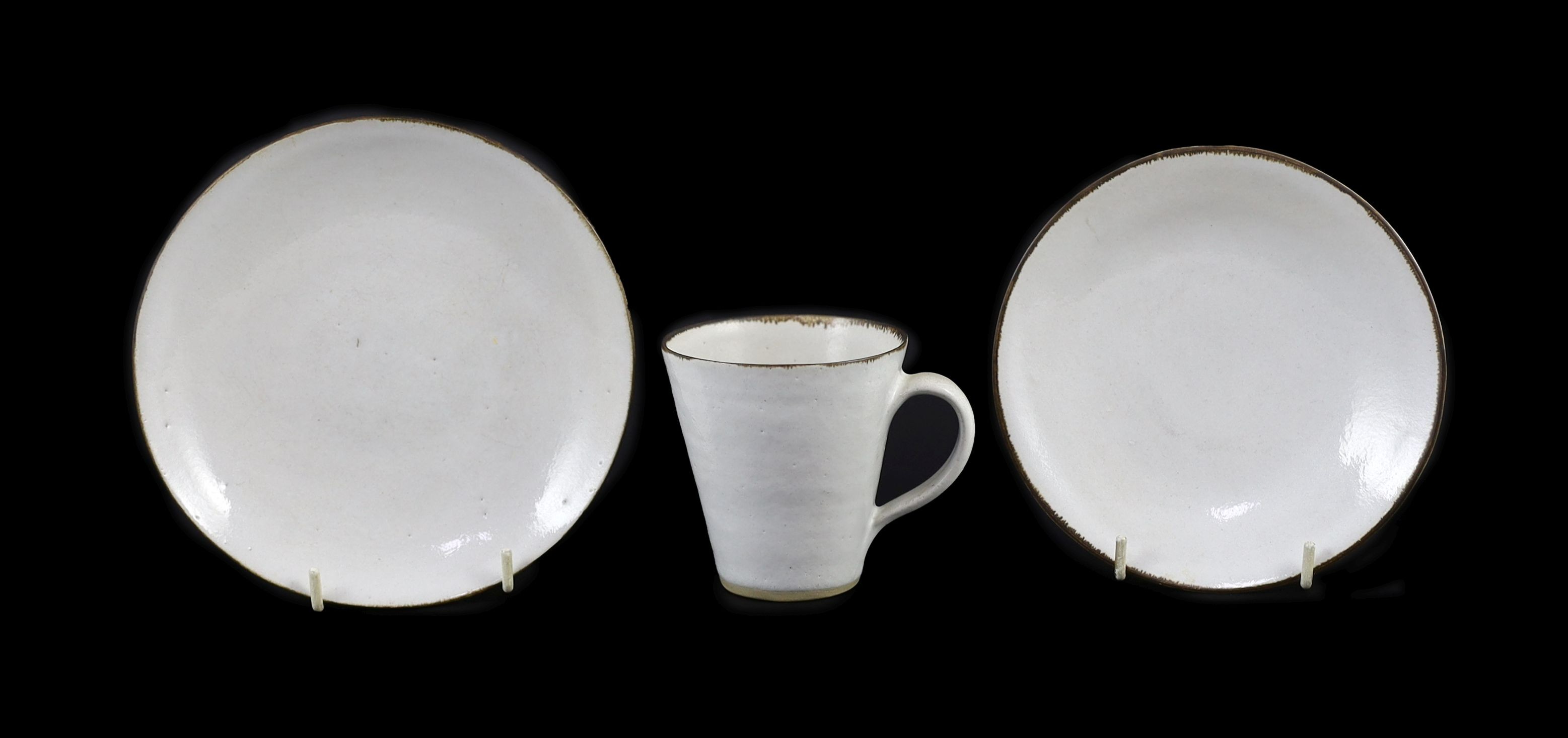 Dame Lucie Rie (1902-1995) a cup, saucer and side plate, c.1959, Cup 8 cm high